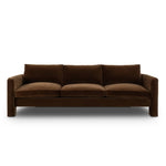 Float-style this unique sofa in a room to show off design details like sleek lines and rear cutouts. Designed with S spring construction, foam and fiber seat cushioning and loose feather-blend back cushions. Upholstered in a soft, velvety cotton in a rich chocolate brown Amethyst Home provides interior design, new home construction design consulting, vintage area rugs, and lighting in the Houston metro area.