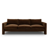 Float-style this unique sofa in a room to show off design details like sleek lines and rear cutouts. Designed with S spring construction, foam and fiber seat cushioning and loose feather-blend back cushions. Upholstered in a soft, velvety cotton in a rich chocolate brown Amethyst Home provides interior design, new home construction design consulting, vintage area rugs, and lighting in the Houston metro area.