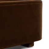 Float-style this unique sofa in a room to show off design details like sleek lines and rear cutouts. Designed with S spring construction, foam and fiber seat cushioning and loose feather-blend back cushions. Upholstered in a soft, velvety cotton in a rich chocolate brown Amethyst Home provides interior design, new home construction design consulting, vintage area rugs, and lighting in the Miami metro area.