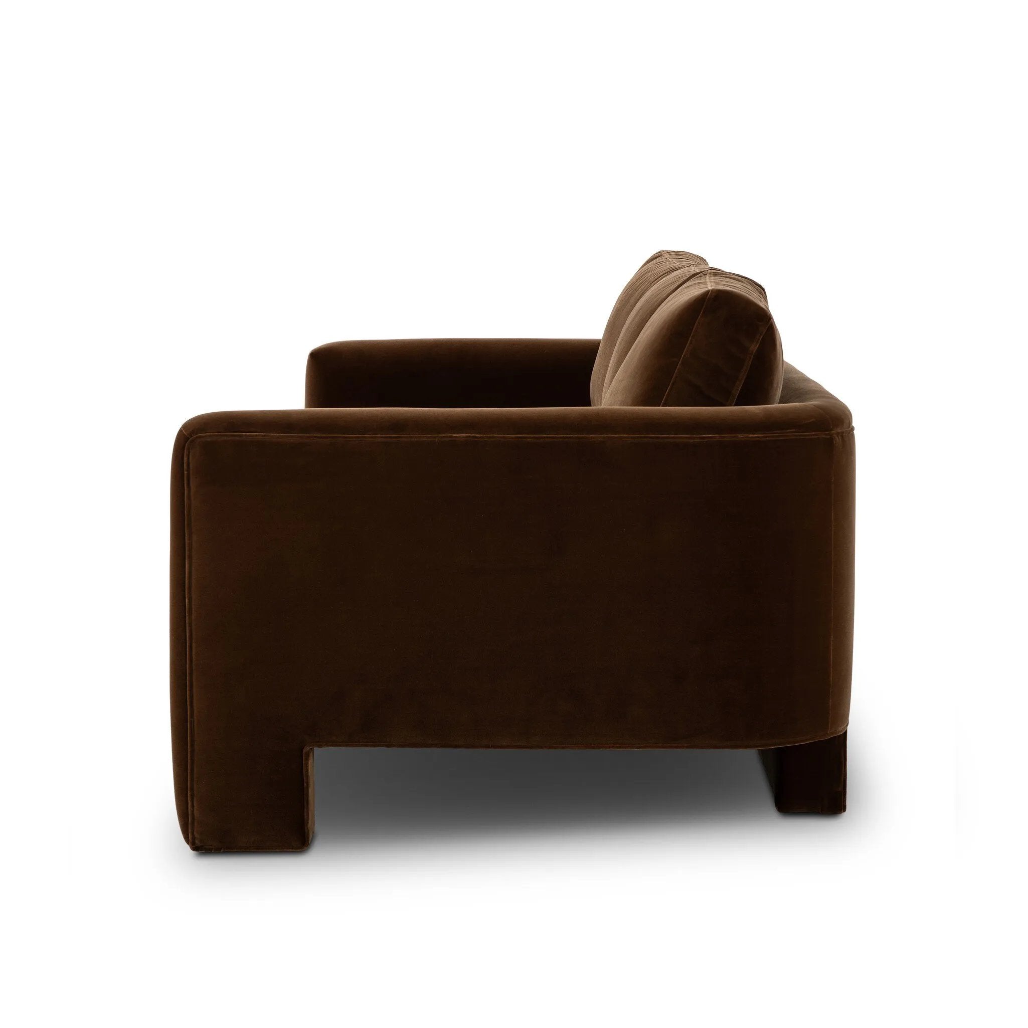 Float-style this unique sofa in a room to show off design details like sleek lines and rear cutouts. Designed with S spring construction, foam and fiber seat cushioning and loose feather-blend back cushions. Upholstered in a soft, velvety cotton in a rich chocolate brown Amethyst Home provides interior design, new home construction design consulting, vintage area rugs, and lighting in the Omaha metro area.