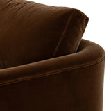 Float-style this unique sofa in a room to show off design details like sleek lines and rear cutouts. Designed with S spring construction, foam and fiber seat cushioning and loose feather-blend back cushions. Upholstered in a soft, velvety cotton in a rich chocolate brown Amethyst Home provides interior design, new home construction design consulting, vintage area rugs, and lighting in the Scottsdale metro area.