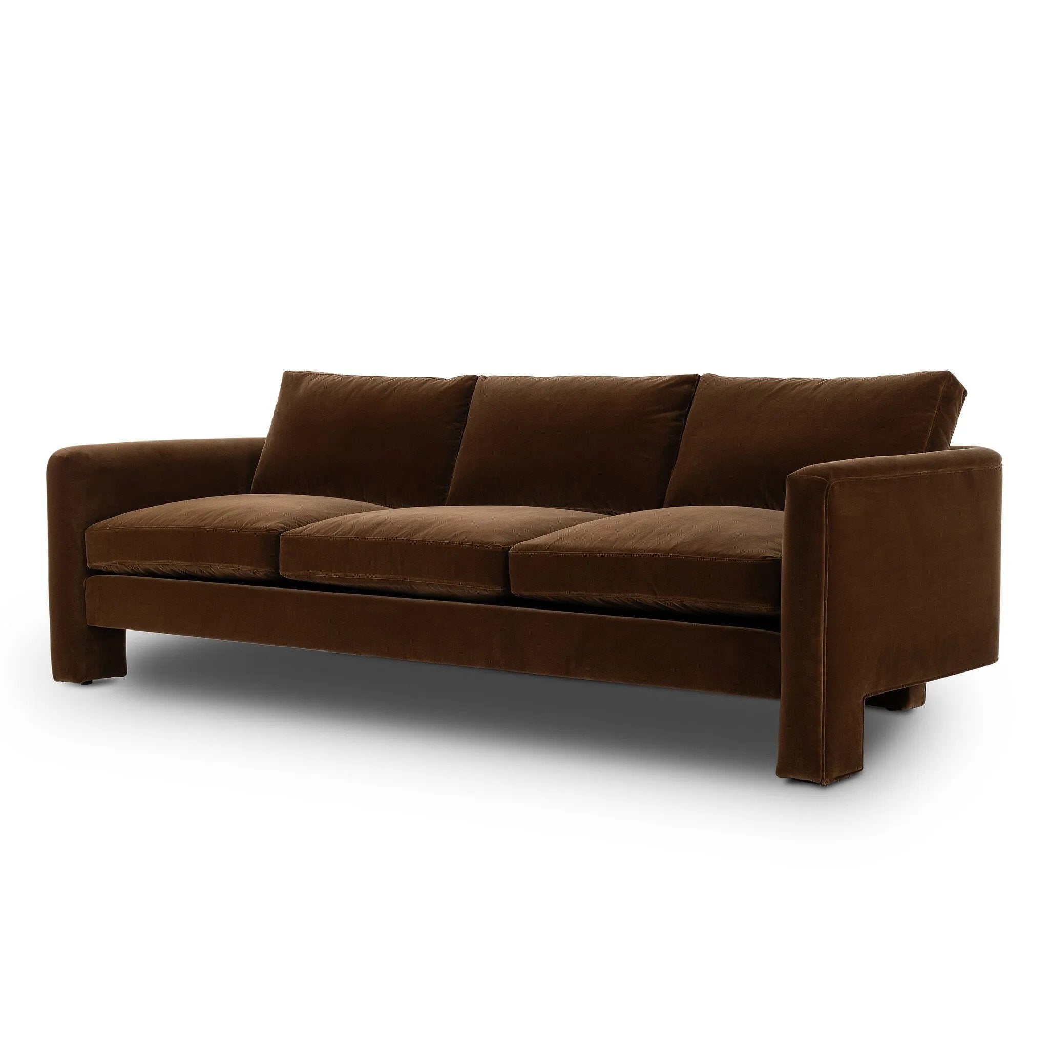 Float-style this unique sofa in a room to show off design details like sleek lines and rear cutouts. Designed with S spring construction, foam and fiber seat cushioning and loose feather-blend back cushions. Upholstered in a soft, velvety cotton in a rich chocolate brown Amethyst Home provides interior design, new home construction design consulting, vintage area rugs, and lighting in the Seattle metro area.