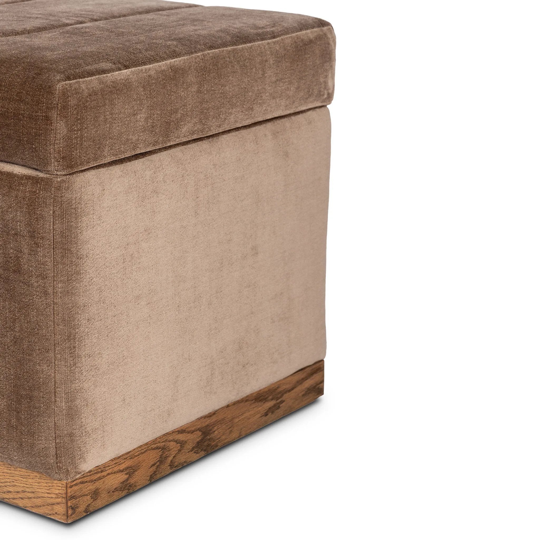 Picture this contemporary yet timeless trunk at the foot of your bed, for storage of extra linens, clothing or throw pillows. This soft, structured piece features a velvety fabric with vertical channel tufting. All grounded by a solid oak base. Amethyst Home provides interior design, new home construction design consulting, vintage area rugs, and lighting in the Kansas City metro area.