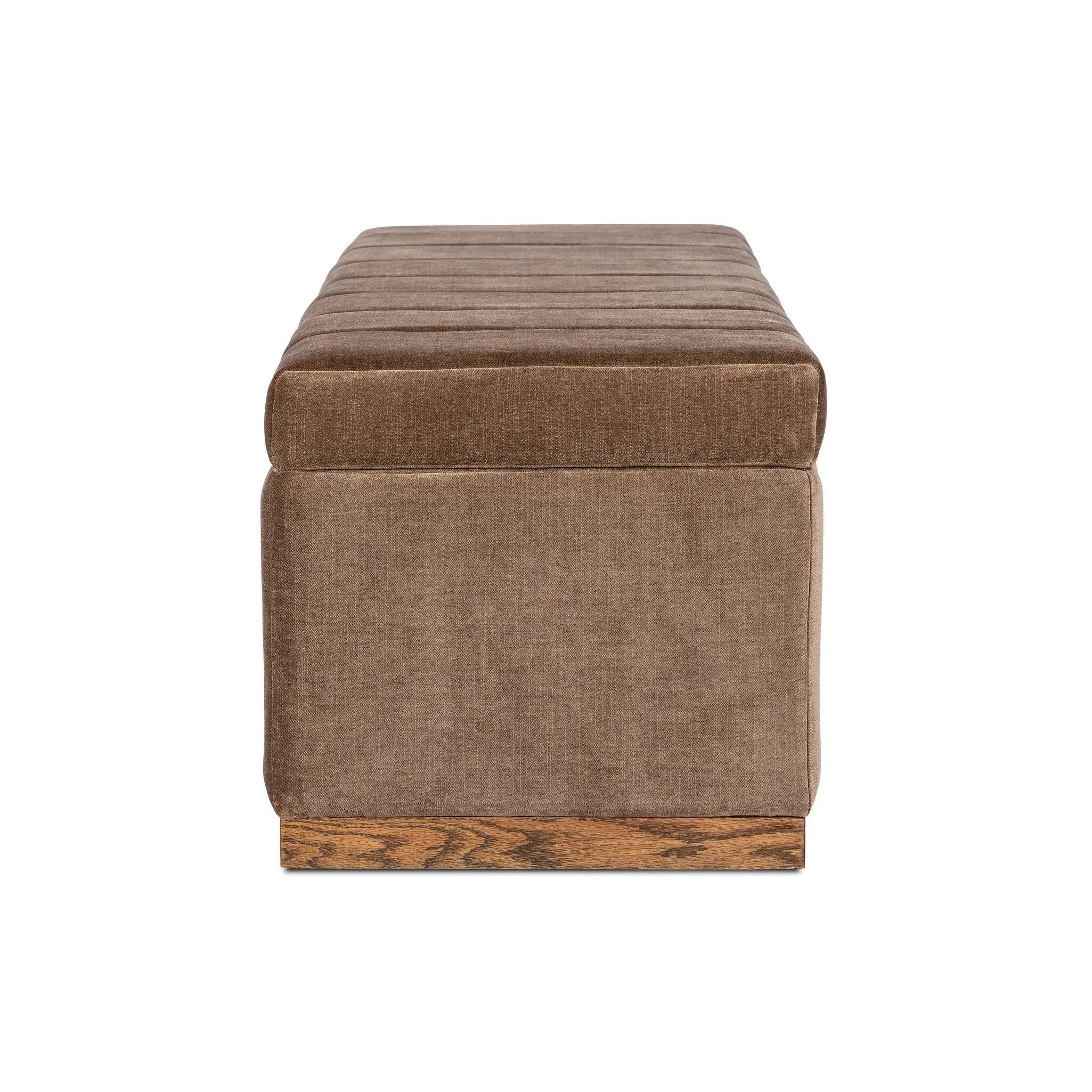 Picture this contemporary yet timeless trunk at the foot of your bed, for storage of extra linens, clothing or throw pillows. This soft, structured piece features a velvety fabric with vertical channel tufting. All grounded by a solid oak base. Amethyst Home provides interior design, new home construction design consulting, vintage area rugs, and lighting in the Newport Beach metro area.