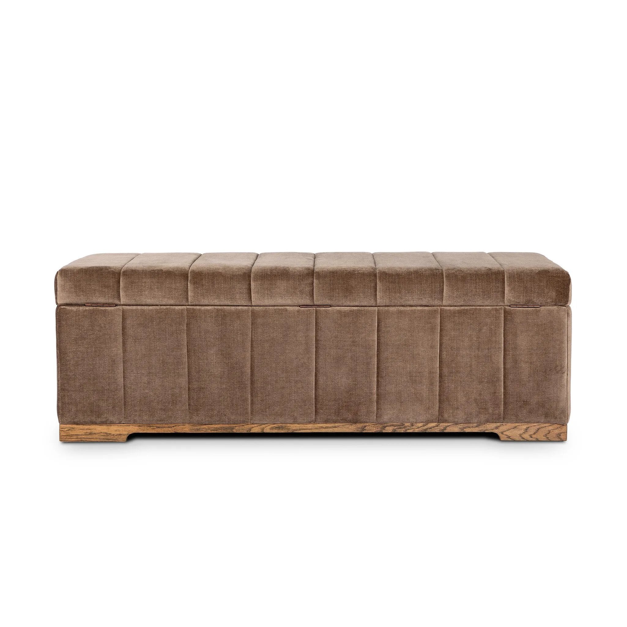 Picture this contemporary yet timeless trunk at the foot of your bed, for storage of extra linens, clothing or throw pillows. This soft, structured piece features a velvety fabric with vertical channel tufting. All grounded by a solid oak base. Amethyst Home provides interior design, new home construction design consulting, vintage area rugs, and lighting in the Washington metro area.