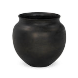 Cast aluminum featuring thousands of small, hammered details adds traditional flair to this outdoor-safe vessel, inspired by copper work found in Mexico. Finished in an antique bronze that's dark and sophisticated.As lovers of organic modern materials at Amethyst, we love the optimistic inspired Kavya Planter. Amethyst Home provides interior design, new home construction design consulting, vintage area rugs, and lighting in the Tampa metro area.