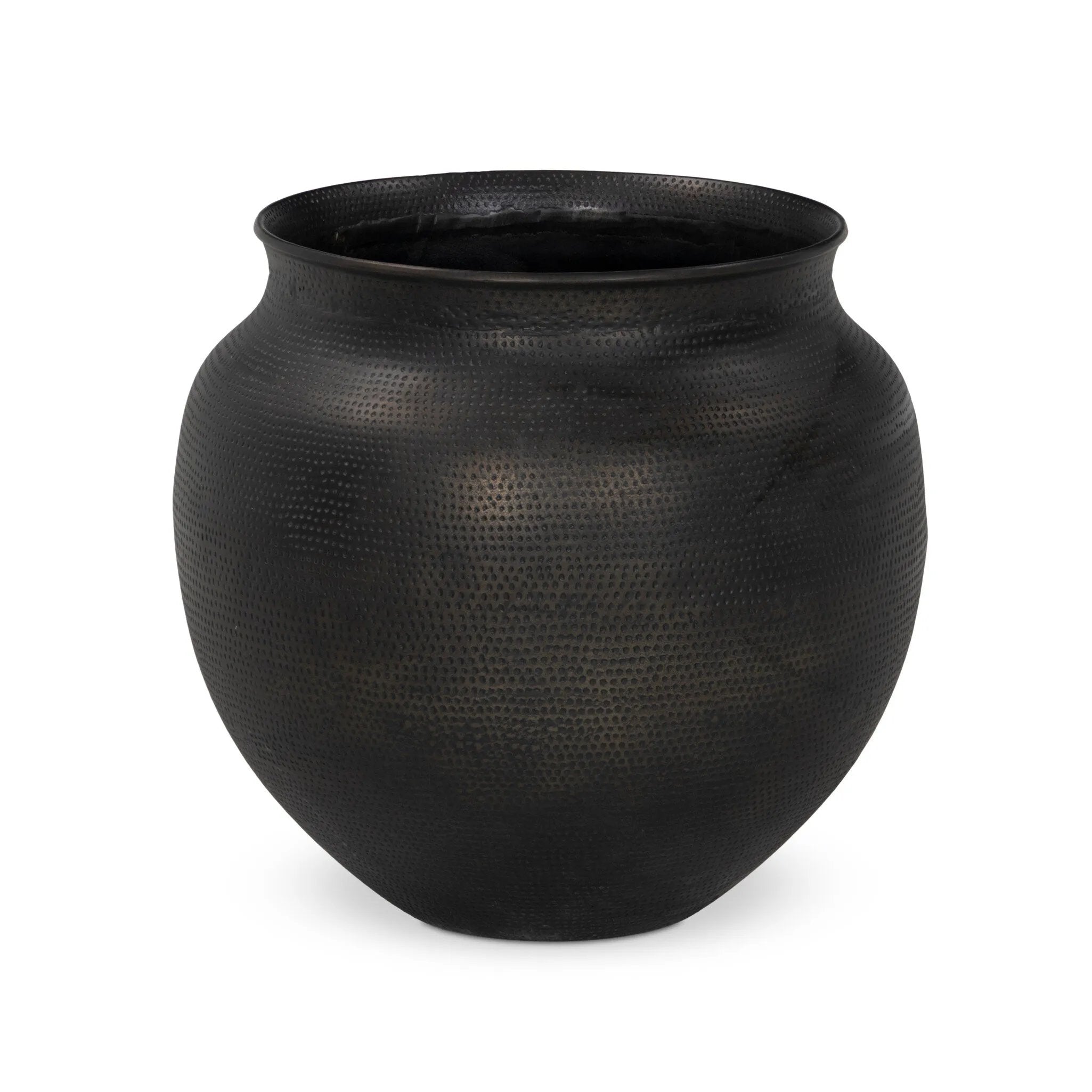 Cast aluminum featuring thousands of small, hammered details adds traditional flair to this outdoor-safe vessel, inspired by copper work found in Mexico. Finished in an antique bronze that's dark and sophisticated.As lovers of organic modern materials at Amethyst, we love the optimistic inspired Kavya Planter. Amethyst Home provides interior design, new home construction design consulting, vintage area rugs, and lighting in the Tampa metro area.