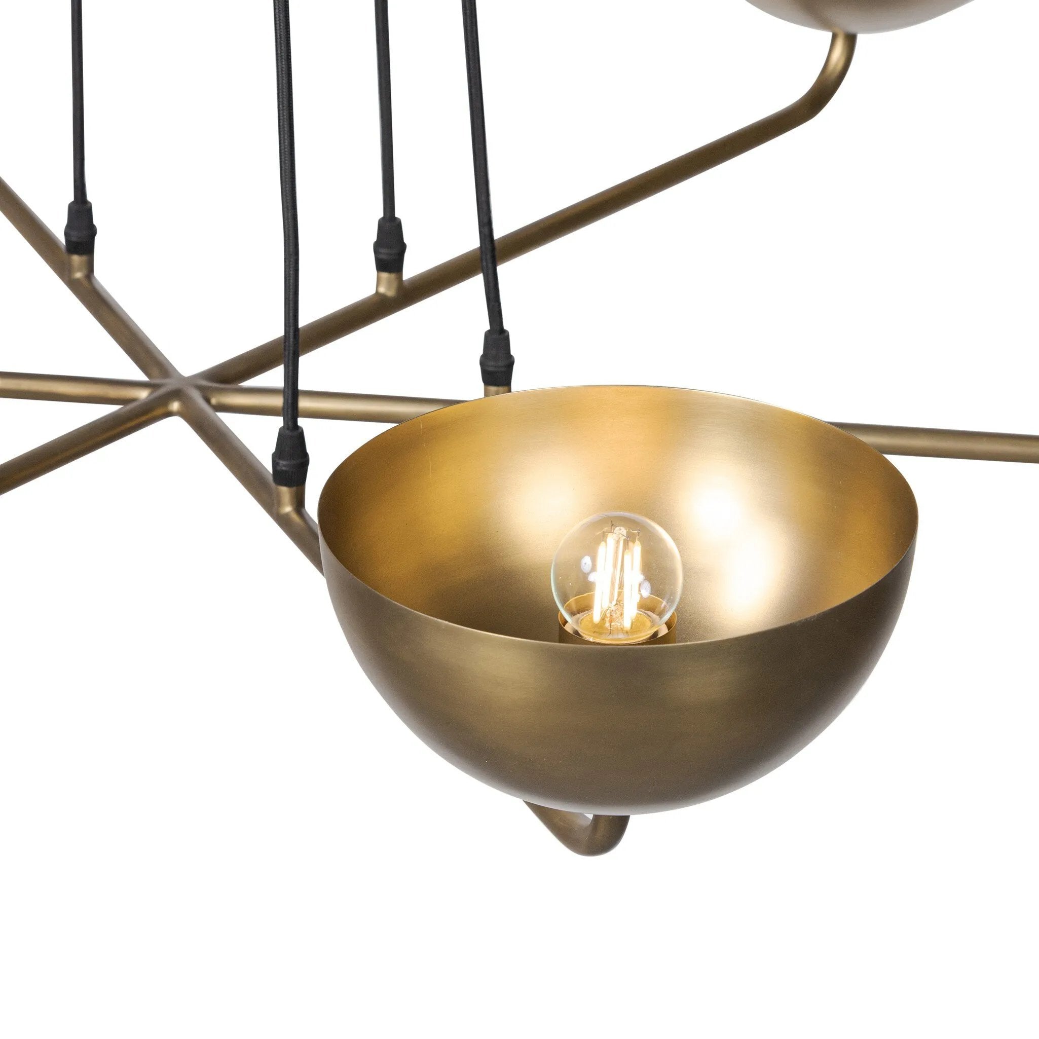 Six brass discs float on gently curved arms, suspended by adjustable black fabric cords that become an integral part of the design. The piece invites customization, allowing you to set the perfect length for your space. The bulbs nestle discreetly within each disc, creating a warm, diffused glow. G16.5 bulbs recommended Amethyst Home provides interior design, new home construction design consulting, vintage area rugs, and lighting in the Alpharetta metro area.