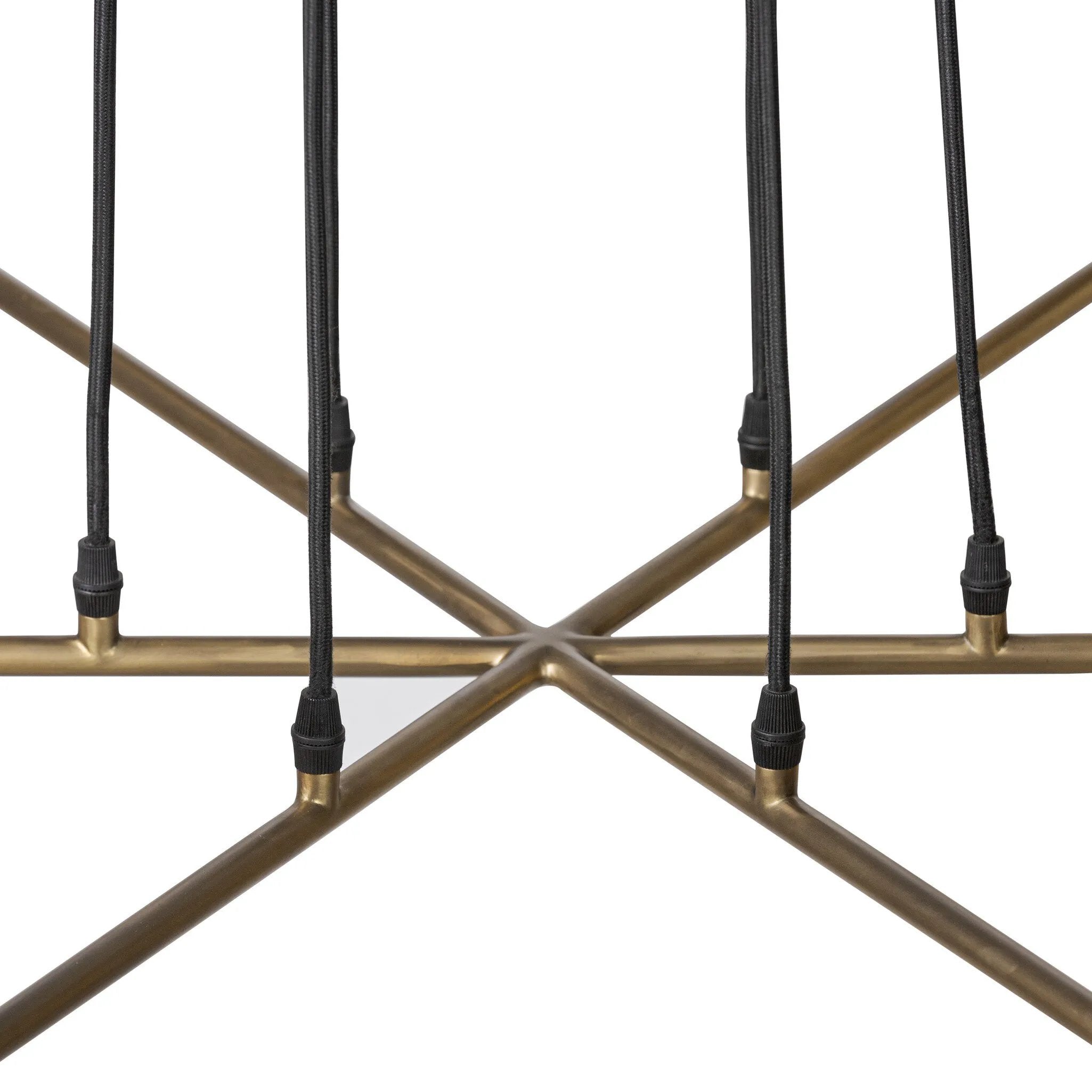 Six brass discs float on gently curved arms, suspended by adjustable black fabric cords that become an integral part of the design. The piece invites customization, allowing you to set the perfect length for your space. The bulbs nestle discreetly within each disc, creating a warm, diffused glow. G16.5 bulbs recommended Amethyst Home provides interior design, new home construction design consulting, vintage area rugs, and lighting in the Houston metro area.