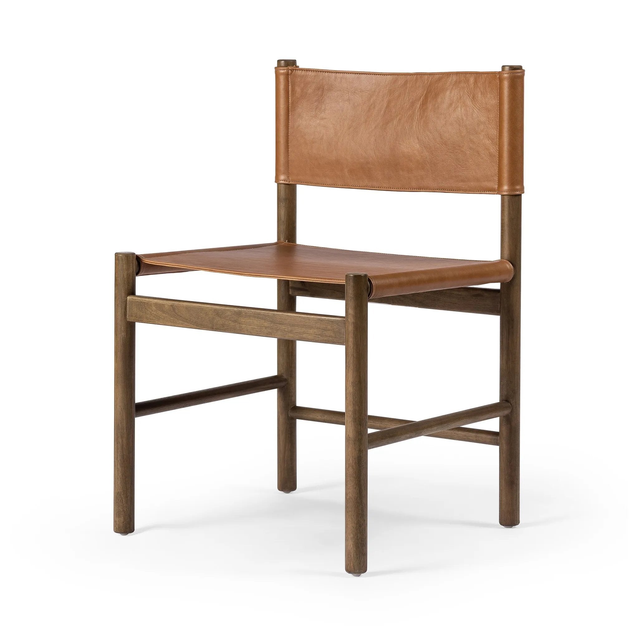 Solid parawood forms a simple, vintage-inspired frame for sling-style seating of top-grain leather exclusive to Four Hands Amethyst Home provides interior design, new home construction design consulting, vintage area rugs, and lighting in the Calabasas metro area.