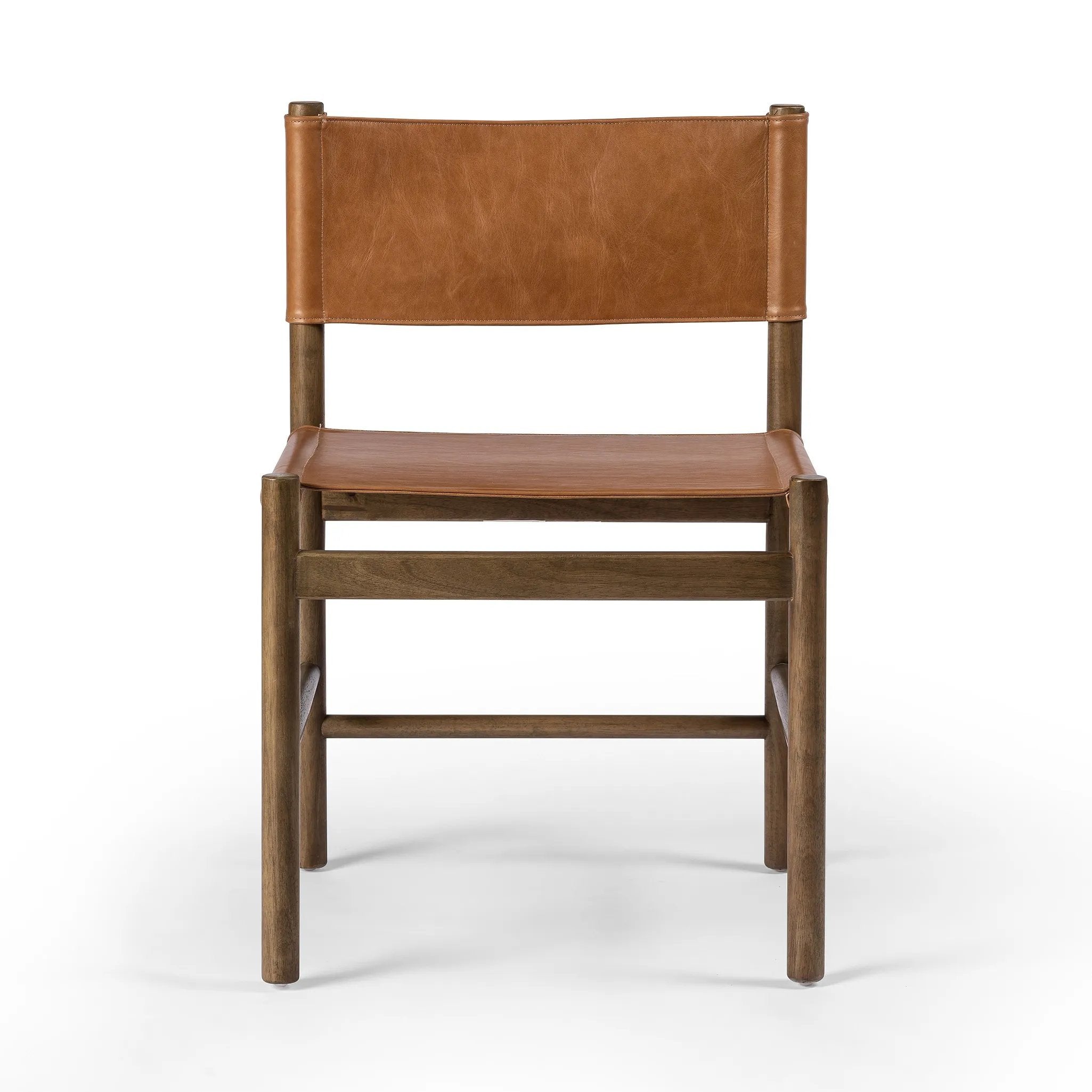 Solid parawood forms a simple, vintage-inspired frame for sling-style seating of top-grain leather exclusive to Four Hands Amethyst Home provides interior design, new home construction design consulting, vintage area rugs, and lighting in the Seattle metro area.