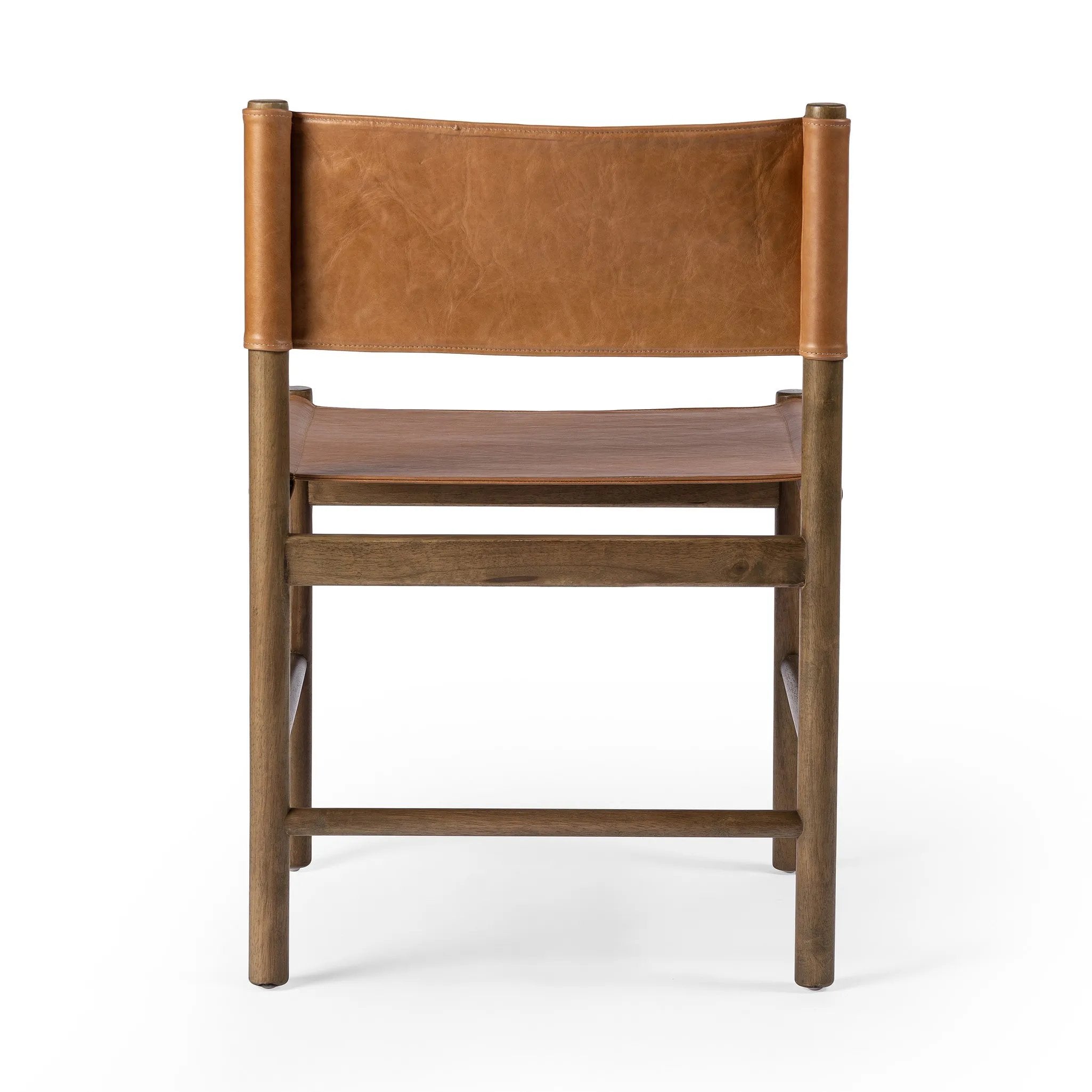 Solid parawood forms a simple, vintage-inspired frame for sling-style seating of top-grain leather exclusive to Four Hands Amethyst Home provides interior design, new home construction design consulting, vintage area rugs, and lighting in the Washington metro area.