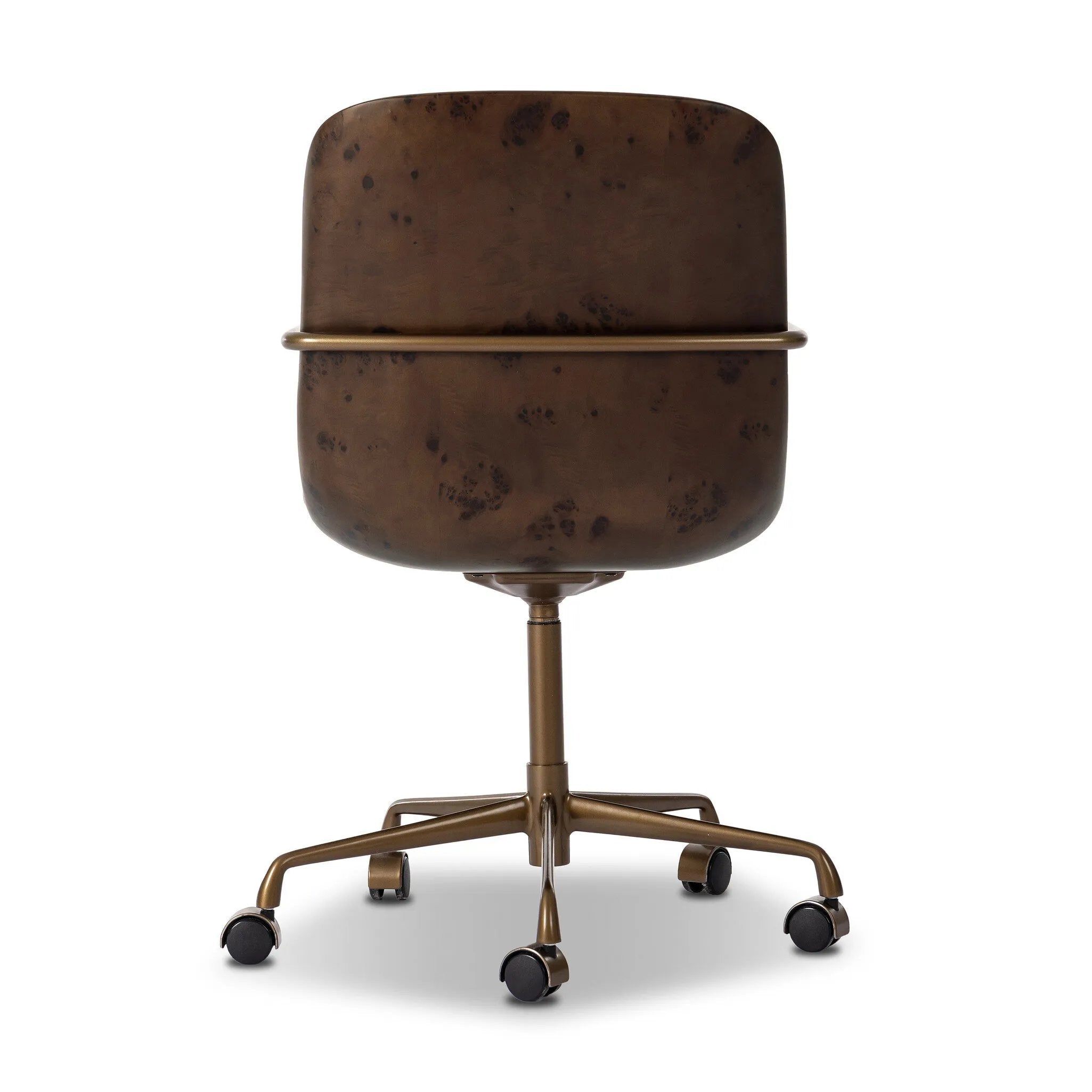 Our mixed material take on the midcentury molded ply chair. Plush ochre velvet seating pairs with a wooden back of rich brown burl and burnished brass arms that wrap under the seat and behind the back, for a continuous, flowing feel. This design-forward material mix creates a tonal and textural contrast that feels both found and fresh. Amethyst Home provides interior design, new home construction design consulting, vintage area rugs, and lighting in the Monterey metro area.