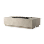 This outdoor fire table is a welcoming centerpiece designed for gathering. Made from glass-reinforced concrete, each piece is naturally finished with deep tones of pewter and dark grey. The monolithic shape is completed with lavastones in the center, bringing together a bold, monochromatic look. Amethyst Home provides interior design, new home construction design consulting, vintage area rugs, and lighting in the Winter Garden metro area.