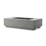 This outdoor fire table is a welcoming centerpiece designed for gathering. Made from glass-reinforced concrete, each piece is naturally finished with deep tones of pewter and dark grey. The monolithic shape is completed with lavastones in the center, bringing together a bold, monochromatic look. Amethyst Home provides interior design, new home construction design consulting, vintage area rugs, and lighting in the Alpharetta metro area.