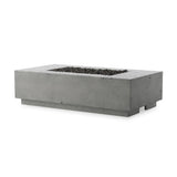 This outdoor fire table is a welcoming centerpiece designed for gathering. Made from glass-reinforced concrete, each piece is naturally finished with deep tones of pewter and dark grey. The monolithic shape is completed with lavastones in the center, bringing together a bold, monochromatic look. Amethyst Home provides interior design, new home construction design consulting, vintage area rugs, and lighting in the Alpharetta metro area.