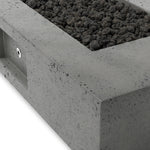 This outdoor fire table is a welcoming centerpiece designed for gathering. Made from glass-reinforced concrete, each piece is naturally finished with deep tones of pewter and dark grey. The monolithic shape is completed with lavastones in the center, bringing together a bold, monochromatic look. Amethyst Home provides interior design, new home construction design consulting, vintage area rugs, and lighting in the Omaha metro area.