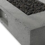 This outdoor fire table is a welcoming centerpiece designed for gathering. Made from glass-reinforced concrete, each piece is naturally finished with deep tones of pewter and dark grey. The monolithic shape is completed with lavastones in the center, bringing together a bold, monochromatic look. Amethyst Home provides interior design, new home construction design consulting, vintage area rugs, and lighting in the Omaha metro area.