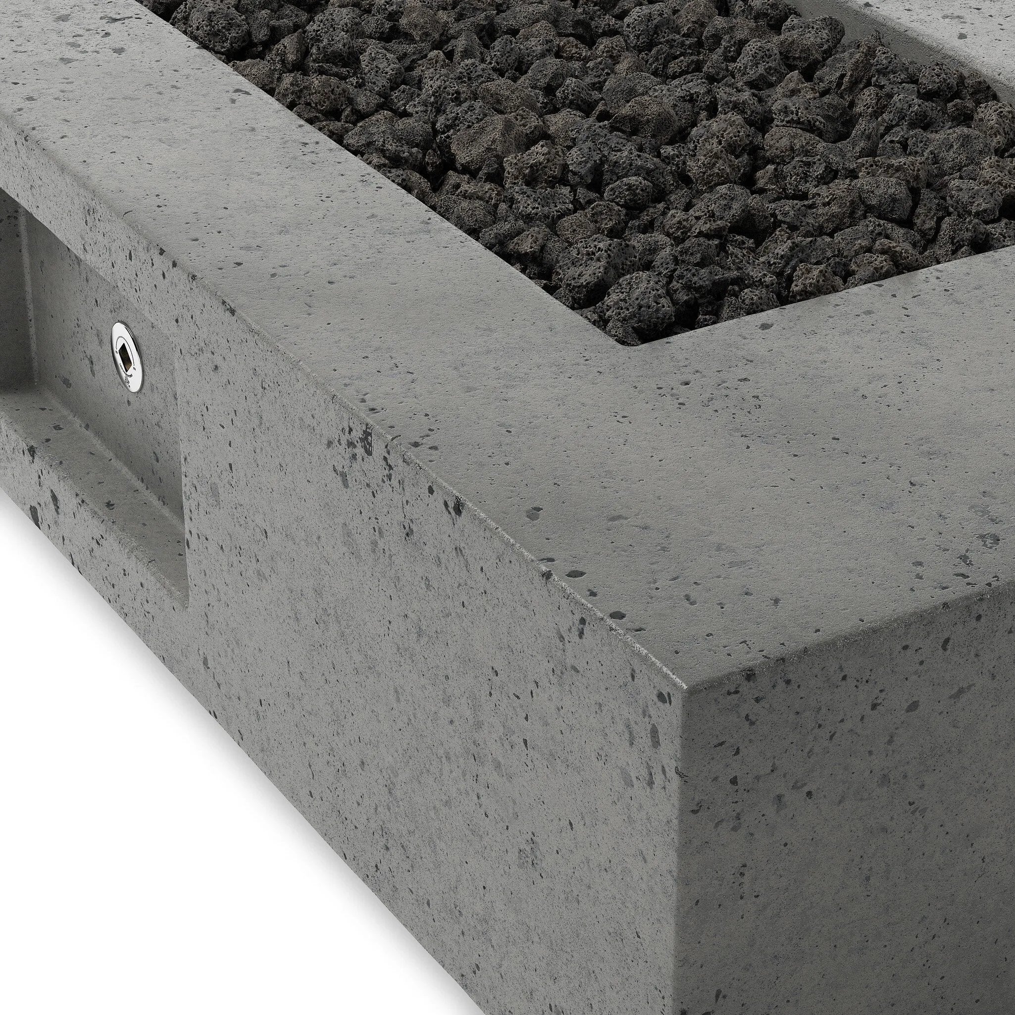 This outdoor fire table is a welcoming centerpiece designed for gathering. Made from glass-reinforced concrete, each piece is naturally finished with deep tones of pewter and dark grey. The monolithic shape is completed with lavastones in the center, bringing together a bold, monochromatic look. Amethyst Home provides interior design, new home construction design consulting, vintage area rugs, and lighting in the Omaha metro area.