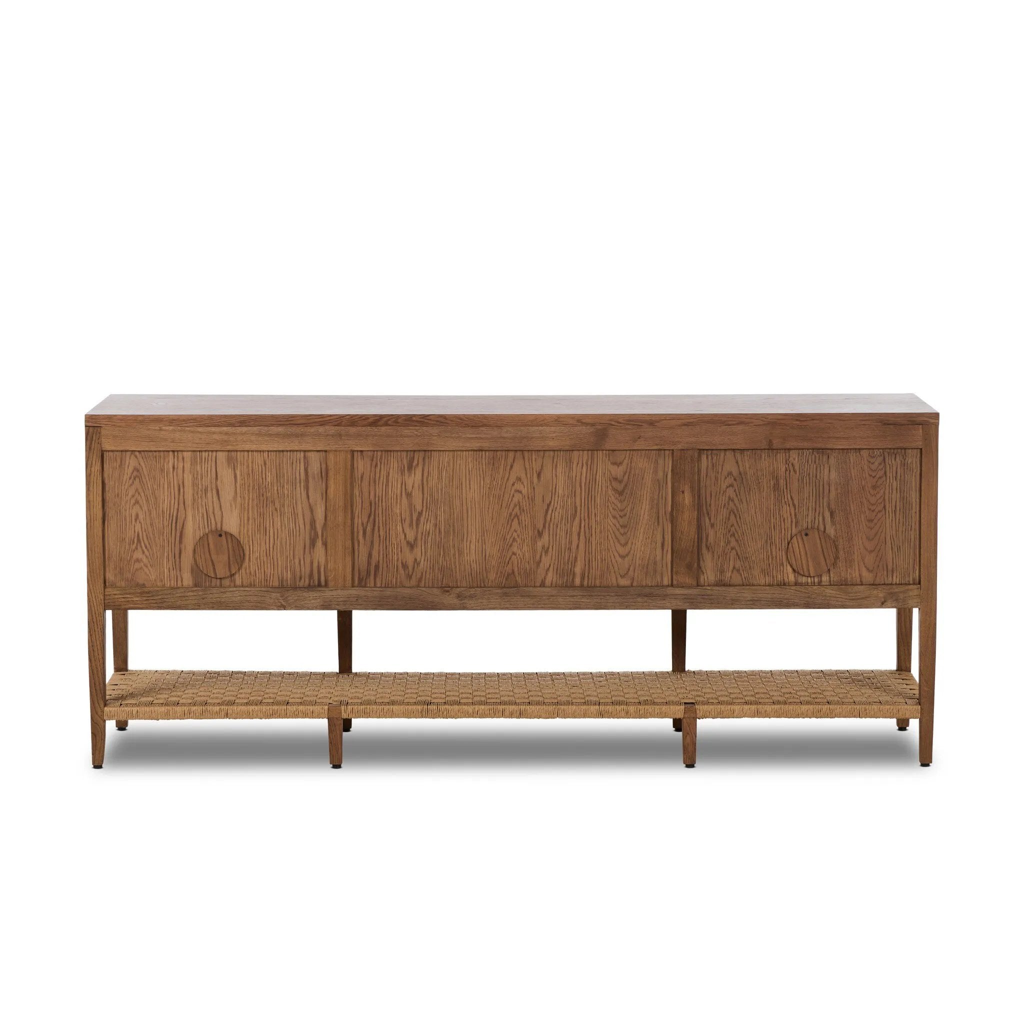 Add a coastal element to your living space with this organic-spirited media console. A woven paper cord shelf in a checkered pattern brings texture to a warm oak frame and tapered legs. Rear cutouts for cord management.As fans of clean materials at Amethyst, we love the optimistic inspired Kenzo Media Console - Warm Natural Oak Veneer. Amethyst Home provides interior design, new home construction design consulting, vintage area rugs, and lighting in the Dallas metro area.
