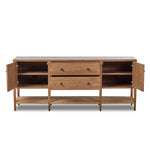 Add a coastal element to your living space with this organic-spirited media console. A woven paper cord shelf in a checkered pattern brings texture to a warm oak frame and tapered legs. Rear cutouts for cord management.As fans of clean materials at Amethyst, we love the optimistic inspired Kenzo Media Console - Warm Natural Oak Veneer. Amethyst Home provides interior design, new home construction design consulting, vintage area rugs, and lighting in the Laguna Beach metro area.