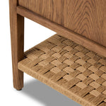 Add a coastal element to your living space with this organic-spirited media console. A woven paper cord shelf in a checkered pattern brings texture to a warm oak frame and tapered legs. Rear cutouts for cord management.As fans of clean materials at Amethyst, we love the optimistic inspired Kenzo Media Console - Warm Natural Oak Veneer. Amethyst Home provides interior design, new home construction design consulting, vintage area rugs, and lighting in the Miami metro area.