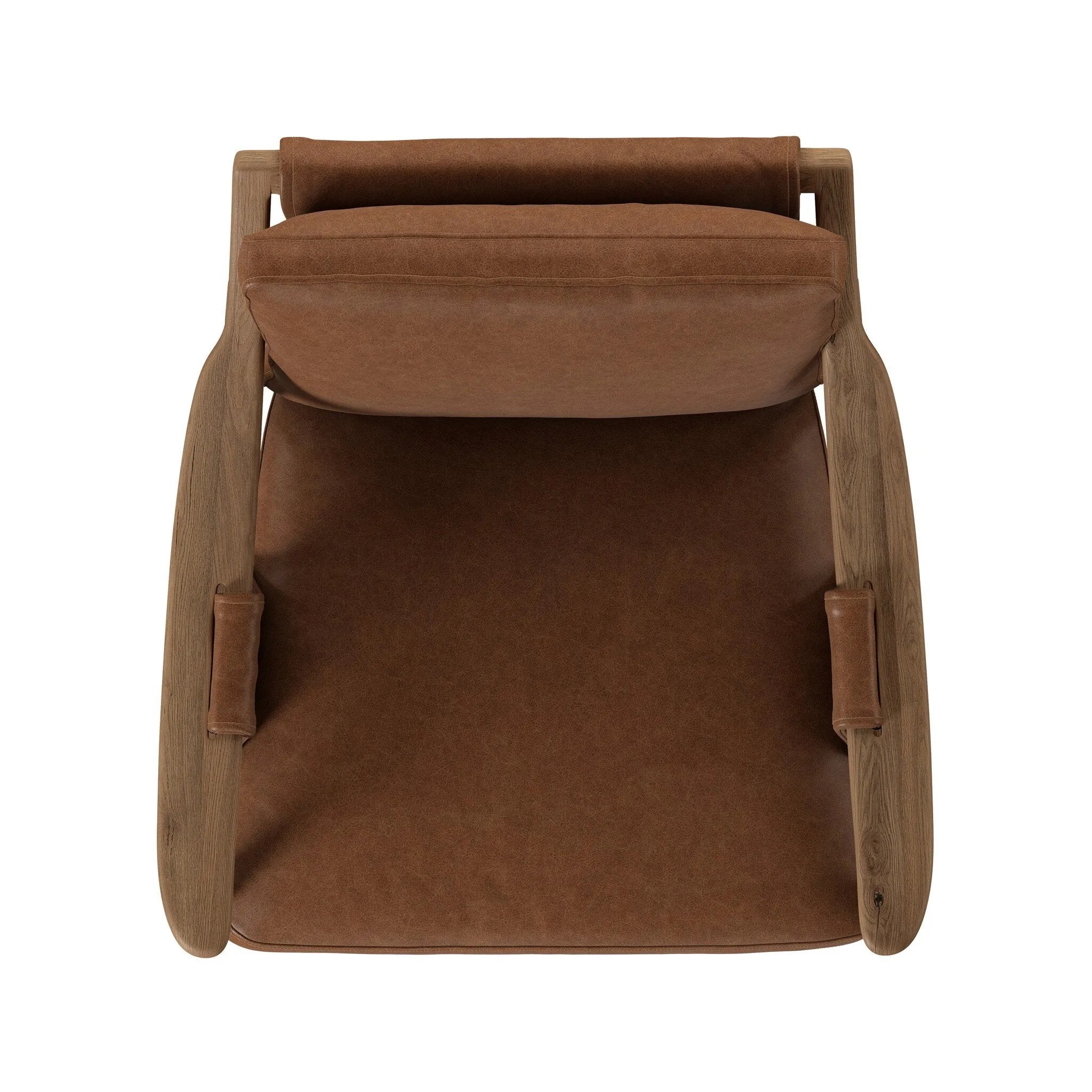 Made with thick-cut top-grain leather with a plump, pronounced grain, a sling-style chair features feather- and fiber-blend cushions for comfort, with clean boxing detailing. Between tapered oak legs, stretchers shape a slight arch, for an intriguing design detail Amethyst Home provides interior design, new home construction design consulting, vintage area rugs, and lighting in the Los Angeles metro area.