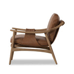 Made with thick-cut top-grain leather with a plump, pronounced grain, a sling-style chair features feather- and fiber-blend cushions for comfort, with clean boxing detailing. Between tapered oak legs, stretchers shape a slight arch, for an intriguing design detail Amethyst Home provides interior design, new home construction design consulting, vintage area rugs, and lighting in the Newport Beach metro area.