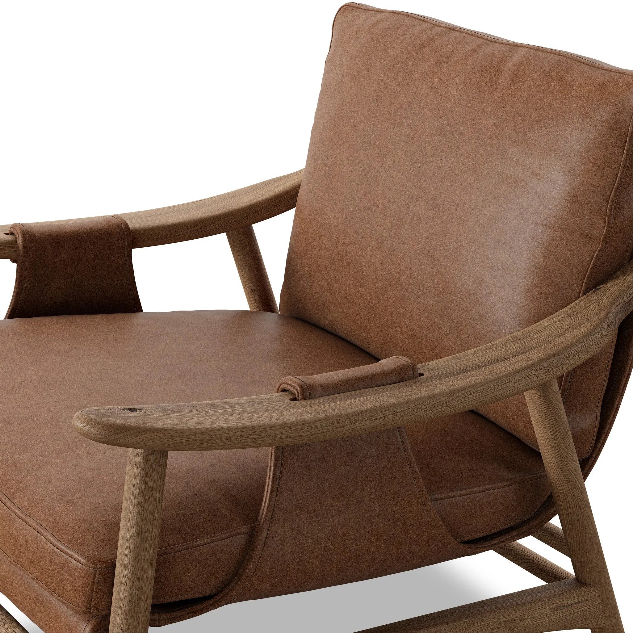 Made with thick-cut top-grain leather with a plump, pronounced grain, a sling-style chair features feather- and fiber-blend cushions for comfort, with clean boxing detailing. Between tapered oak legs, stretchers shape a slight arch, for an intriguing design detail Amethyst Home provides interior design, new home construction design consulting, vintage area rugs, and lighting in the Portland metro area.