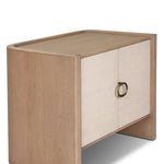Featuring Kiran Sandy Oak Veneer Nightstand by Four Hands at Amethyst Home. Bring storage to your bedside with a monochromatic nightstand of sandy oak and painted linen, with split-circle iron hardware. A spacious interior features removable shelving to custom suit your needs. Overall Dimensions: 30.00"w x 20.00"d x 25.00"h. Amethyst Home provides interior design, new home construction design consulting, vintage area rugs, and lighting in the Portland metro area.