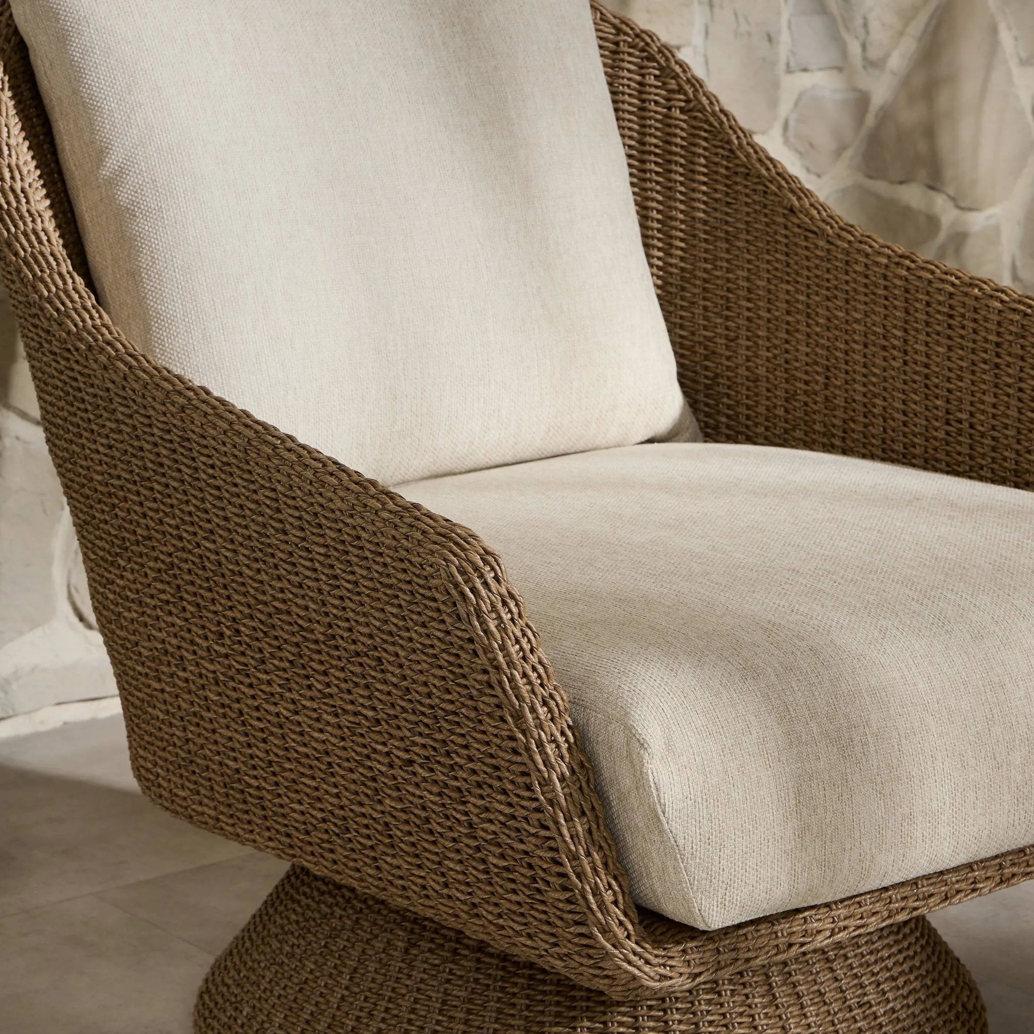 Bring texture outside. Inspired by the classic tulip shape, this outdoor swivel chair features a sculptural, woven faux hyacinth frame and a deep seat and loose back cushion in 100% olefin, known for its UV-resistant, water-repellent and quick-drying abilities. Cover or store indoors during inclement weather and when not in use Amethyst Home provides interior design, new home construction design consulting, vintage area rugs, and lighting in the Salt Lake City metro area.