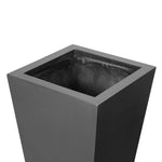 Cast black concrete forms a monolithic planter for use indoors and out. Cover or store indoors during inclement weather and when not in use Amethyst Home provides interior design, new home construction design consulting, vintage area rugs, and lighting in the Calabasas metro area.