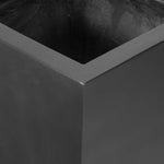 Cast black concrete forms a monolithic planter for use indoors and out. Cover or store indoors during inclement weather and when not in use Amethyst Home provides interior design, new home construction design consulting, vintage area rugs, and lighting in the Houston metro area.