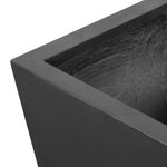 Cast black concrete forms a monolithic planter for use indoors and out. Cover or store indoors during inclement weather and when not in use Amethyst Home provides interior design, new home construction design consulting, vintage area rugs, and lighting in the Nashville metro area.
