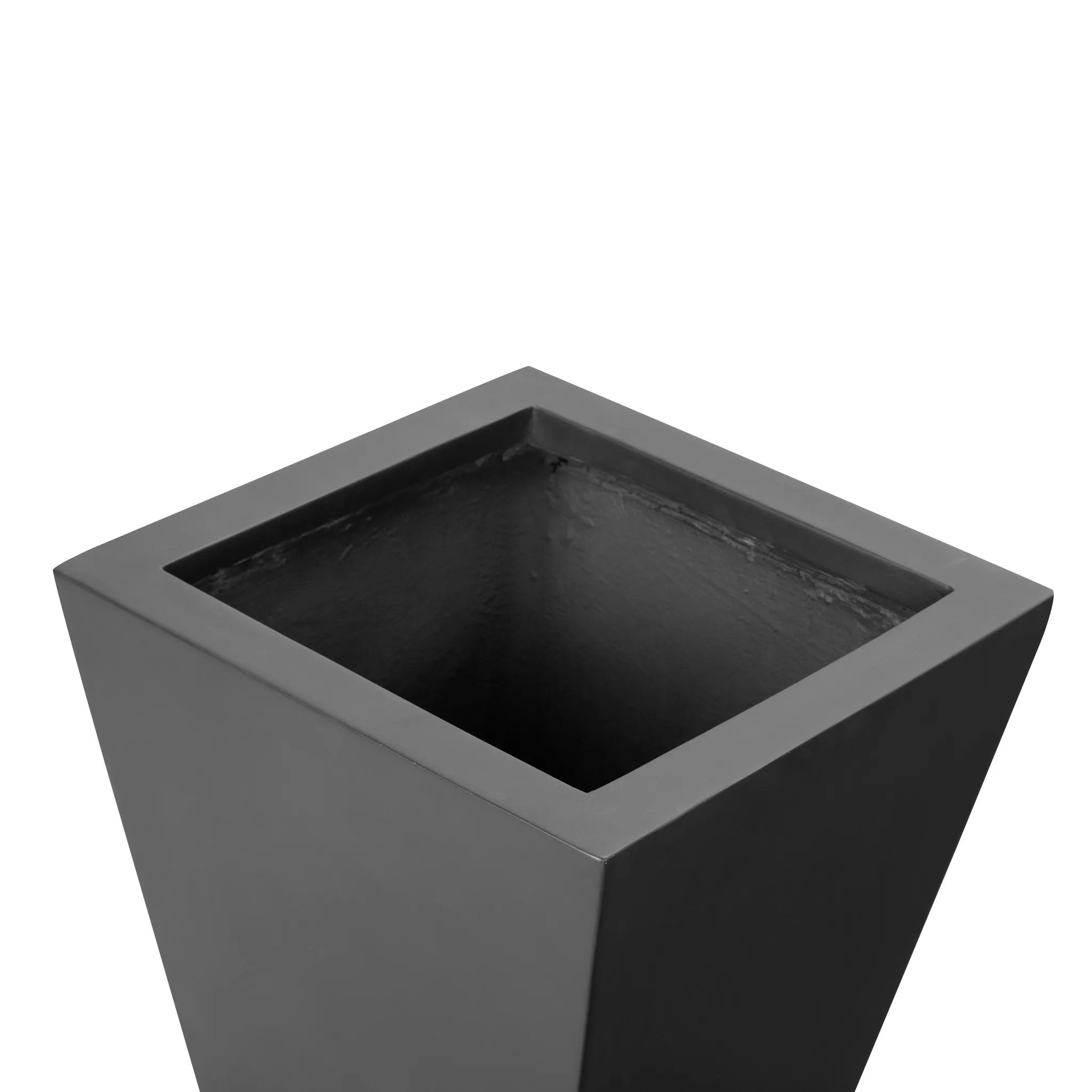 Cast black concrete forms a monolithic planter for use indoors and out. Cover or store indoors during inclement weather and when not in use Amethyst Home provides interior design, new home construction design consulting, vintage area rugs, and lighting in the Park City metro area.