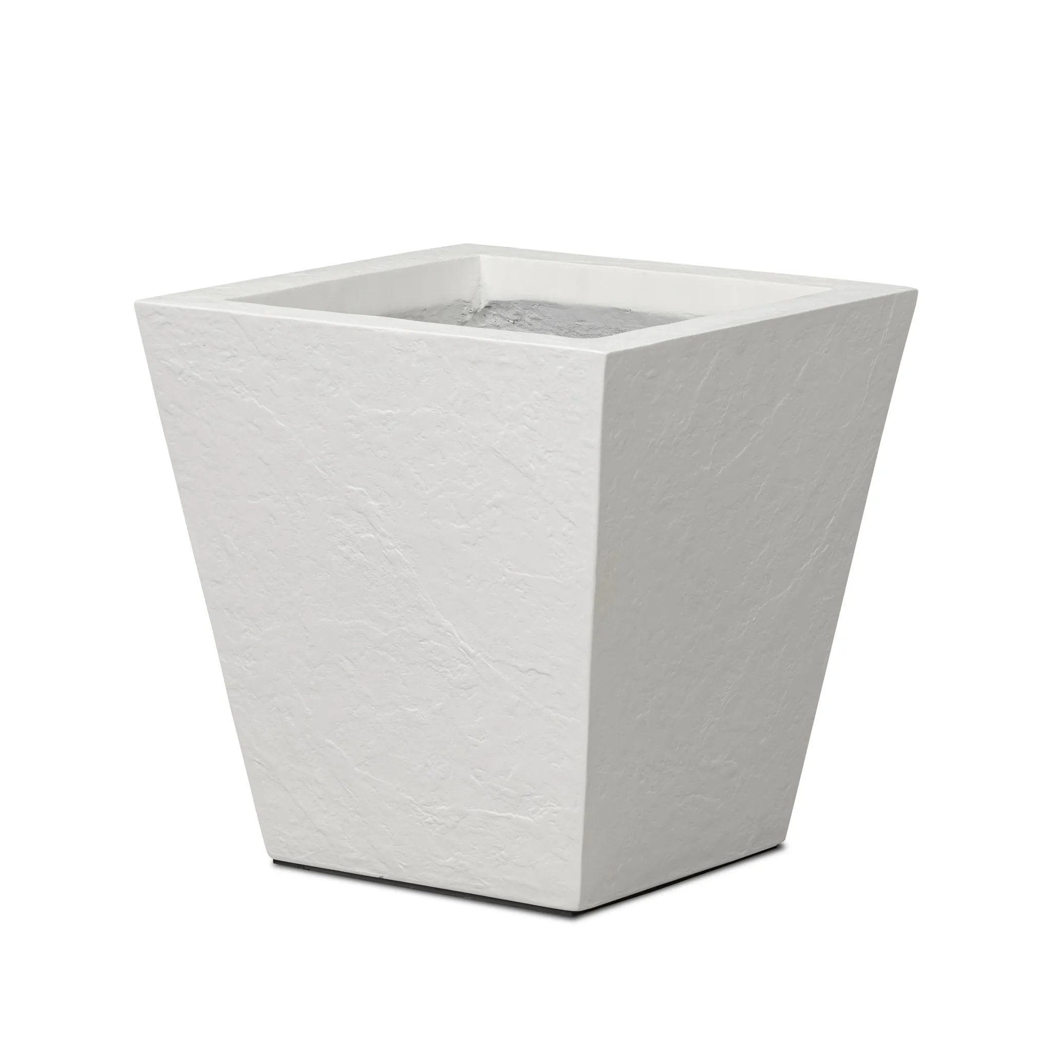 Cast black concrete forms a monolithic planter for use indoors and out. Cover or store indoors during inclement weather and when not in use Amethyst Home provides interior design, new home construction design consulting, vintage area rugs, and lighting in the Washington metro area.