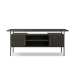 Featuring Lauren Charcoal Oak Resawn Veneer Desk by Four Hands at Amethyst Home. Made from resawn oak and oak veneer, a legal-style desk offers major storage with dual cabinetry, including file storage for legal and letter-size documents. A floating top and iron legs keep the look modern and light. This piece is designed in collaboration with Thomas Bina.. Amethyst Home provides interior design, new home construction design consulting, vintage area rugs, and lighting in the Kansas City metro area.