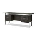 Featuring Lauren Charcoal Oak Resawn Veneer Desk by Four Hands at Amethyst Home. Made from resawn oak and oak veneer, a legal-style desk offers major storage with dual cabinetry, including file storage for legal and letter-size documents. A floating top and iron legs keep the look modern and light. This piece is designed in collaboration with Thomas Bina. Fou. Amethyst Home provides interior design, new home construction design consulting, vintage area rugs, and lighting in the Seattle metro area.