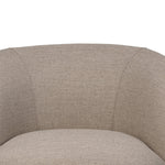 Low in profile with tight, impeccable tailoring, a 360-degree swivel chair is upholstered in a neutral performance fabric that works into a range of spaces and styles with ease. Foam cushioning and S-spring suspension ensures comfort. Amethyst Home provides interior design, new home construction design consulting, vintage area rugs, and lighting in the Newport Beach metro area.