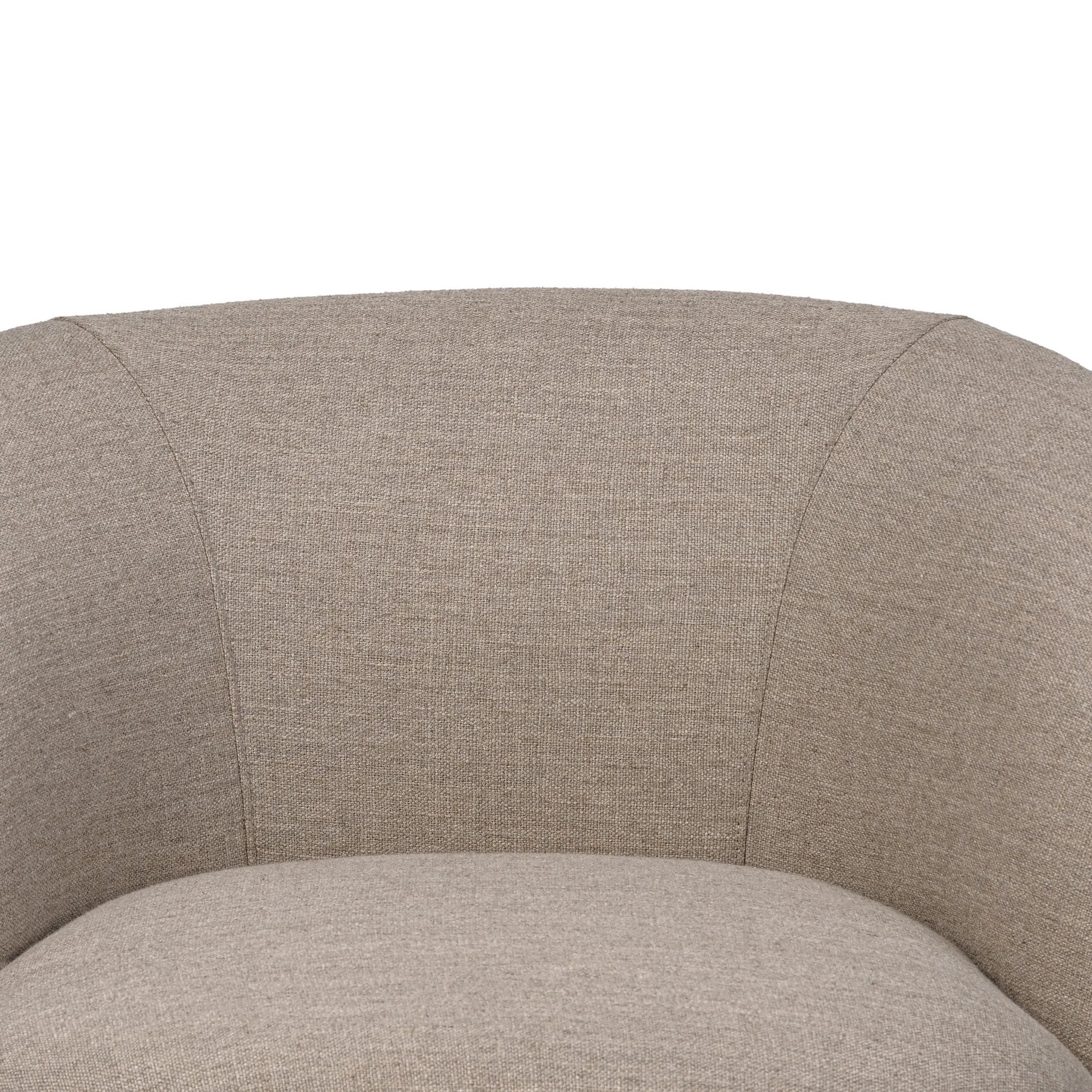 Low in profile with tight, impeccable tailoring, a 360-degree swivel chair is upholstered in a neutral performance fabric that works into a range of spaces and styles with ease. Foam cushioning and S-spring suspension ensures comfort. Amethyst Home provides interior design, new home construction design consulting, vintage area rugs, and lighting in the Newport Beach metro area.