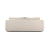 Featuring Lavine Alessi Buff Outdoor Sofa 94" by Four Hands at Amethyst Home. Settle into comfort outdoors. An inviting outdoor sofa features a rounded, inflated silhouette crafted from solid FSC®-certified teak. Finished in high-performance upholstery, with welcoming wide arms and loose back cushions for easy lounging. Cover or store indoors during inclement. Amethyst Home provides interior design, new home construction design consulting, vintage area rugs, and lighting in the Houston metro area.