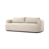 Featuring Lavine Alessi Buff Outdoor Sofa 94" by Four Hands at Amethyst Home. Settle into comfort outdoors. An inviting outdoor sofa features a rounded, inflated silhouette crafted from solid FSC®-certified teak. Finished in high-performance upholstery, with welcoming wide arms and loose back cushions for easy lounging. Cover or store indoors during incleme. Amethyst Home provides interior design, new home construction design consulting, vintage area rugs, and lighting in the San Diego metro area.