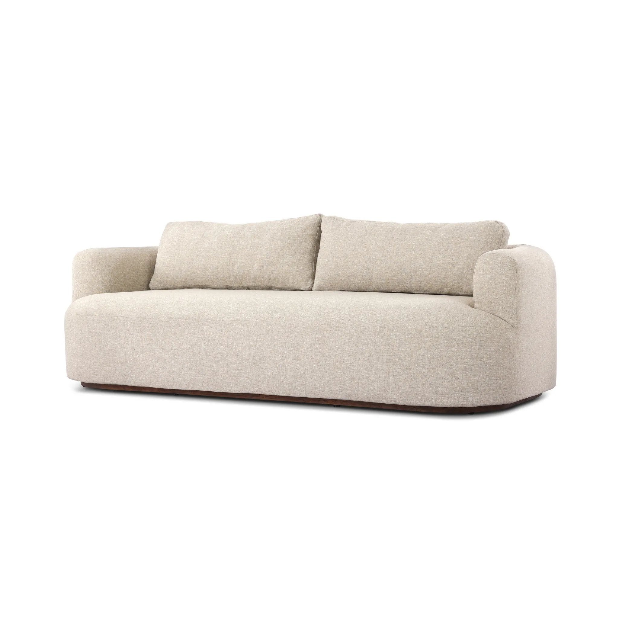 Featuring Lavine Alessi Buff Outdoor Sofa 94" by Four Hands at Amethyst Home. Settle into comfort outdoors. An inviting outdoor sofa features a rounded, inflated silhouette crafted from solid FSC®-certified teak. Finished in high-performance upholstery, with welcoming wide arms and loose back cushions for easy lounging. Cover or store indoors during incleme. Amethyst Home provides interior design, new home construction design consulting, vintage area rugs, and lighting in the San Diego metro area.