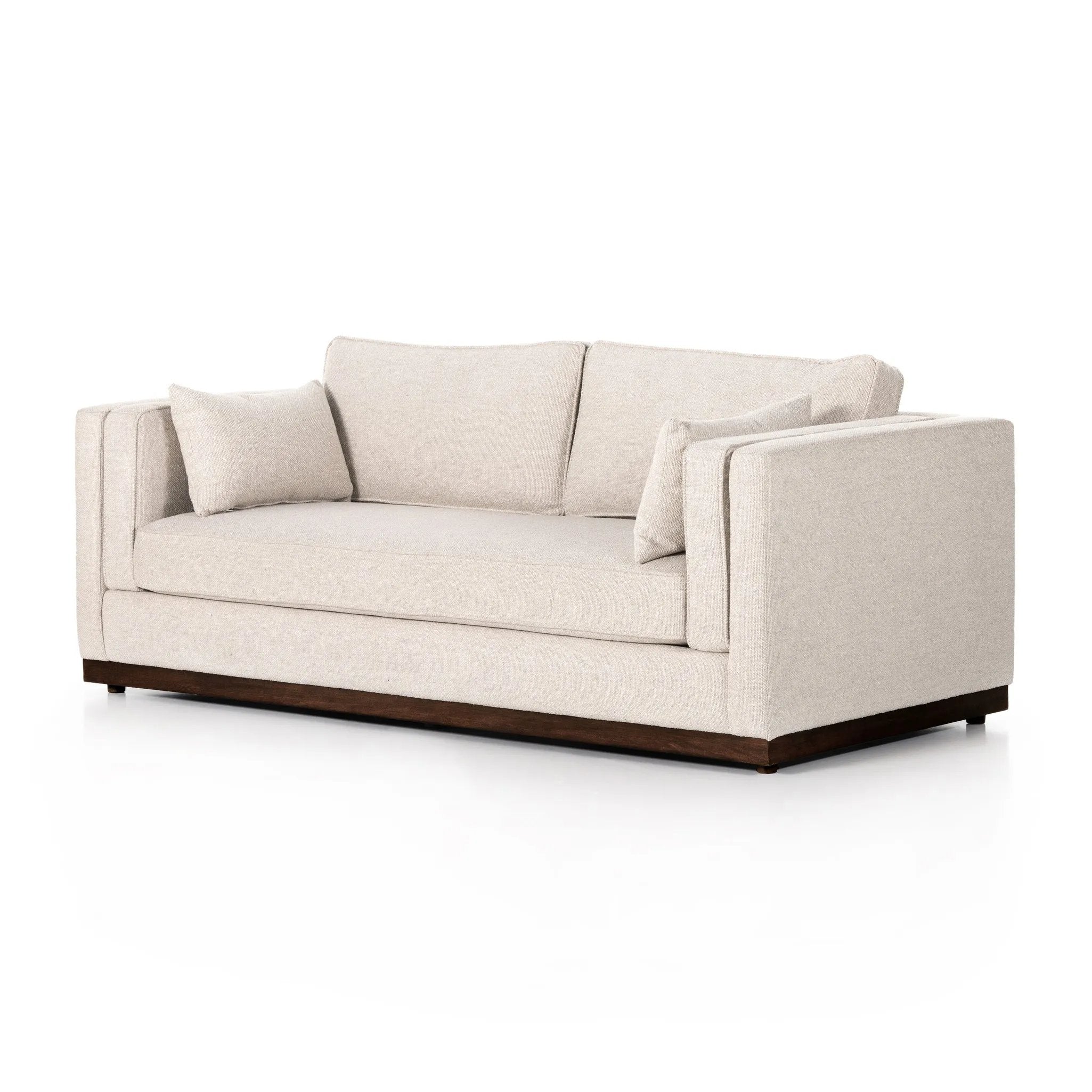 Traditional goes modern. Doubled-stacked arms and cushioning make for a layered look with maximum comfort, while high-performance upholstery is great for everyday lounging. Finished in an auburn walnut, a 360 plinth-style base offers a touch of contrast. Amethyst Home provides interior design, new home construction design consulting, vintage area rugs, and lighting in the Tampa metro area.