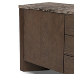 The traditional media console, elevated with mixed materials. Vein-rich marble tops an angular brown oak base, with three drawers flanked by cabinets for storage. Rear cutouts for cord management.As enthusiasts of wabi sabi design at Amethyst, we love the designer inspired Lawson Media Console. Amethyst Home provides interior design, new home construction design consulting, vintage area rugs, and lighting in the Park City metro area.