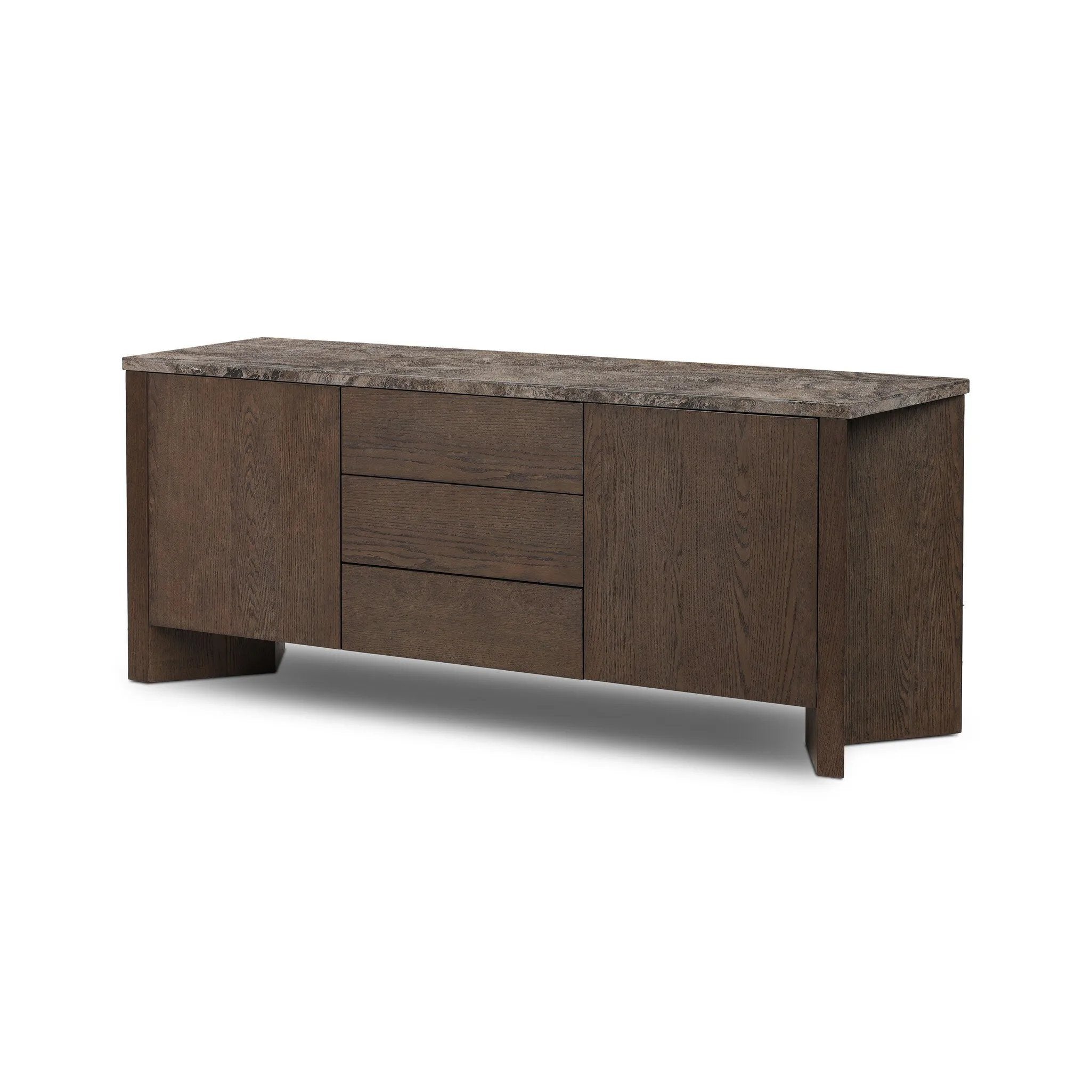 The traditional media console, elevated with mixed materials. Vein-rich marble tops an angular brown oak base, with three drawers flanked by cabinets for storage. Rear cutouts for cord management.As enthusiasts of wabi sabi design at Amethyst, we love the designer inspired Lawson Media Console. Amethyst Home provides interior design, new home construction design consulting, vintage area rugs, and lighting in the Portland metro area.
