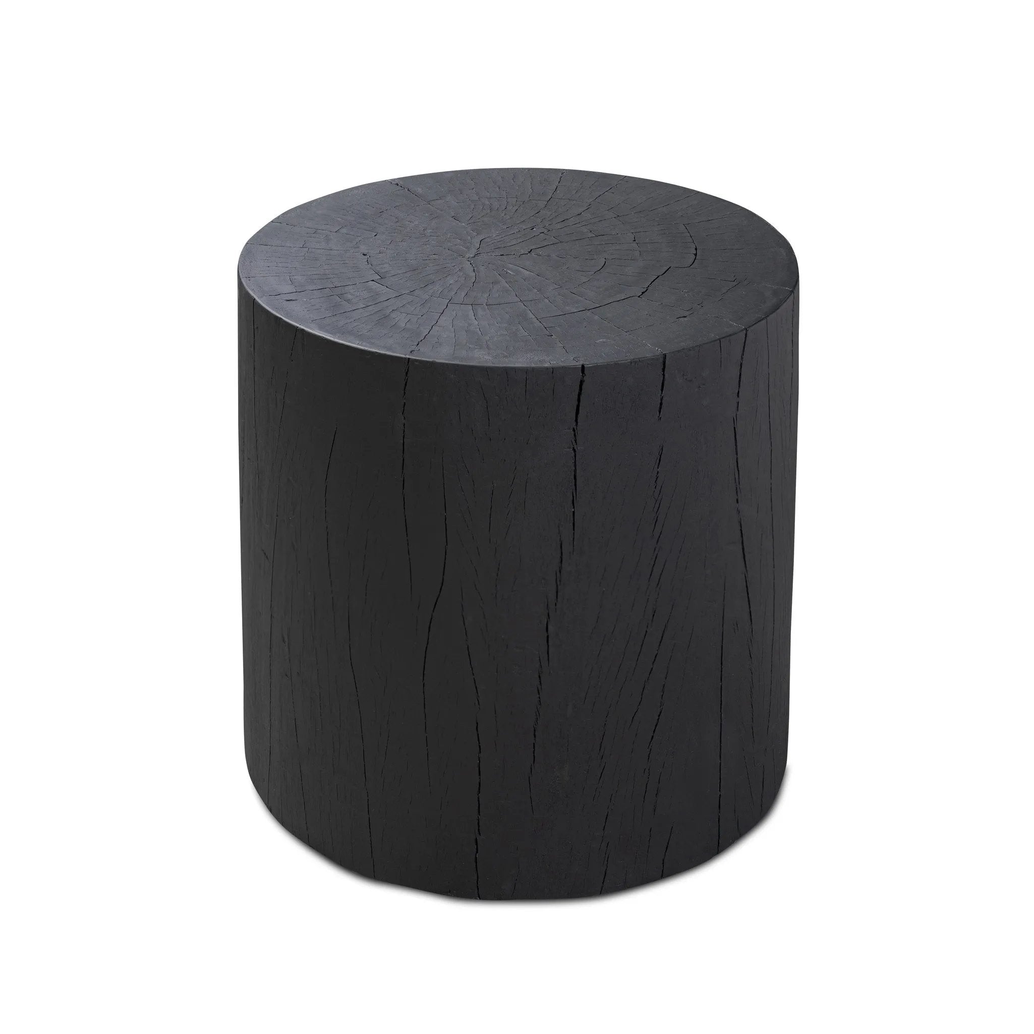 Ground any room with a style inspired by the beautiful simplicity of nature. Made of black-finished resin, the form for this special piece is molded from a tree trunk that's been cut into a circle, then cast in resin to recreate the same  texture of the trunk, even the saw marks where it was cut — talk about a true statement piece Amethyst Home provides interior design, new home construction design consulting, vintage area rugs, and lighting in the Portland metro area.