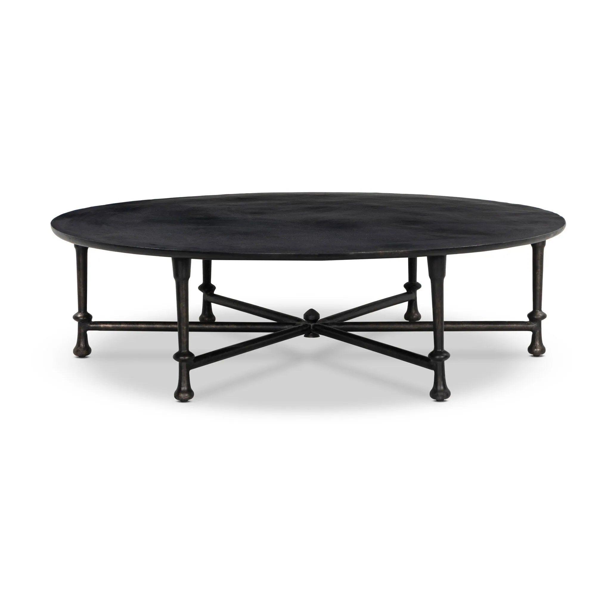 Cast aluminum shapes this statement outdoor coffee table. Each of the six legs features turned detailing, finished in a distressed bronze that highlights the subtle movement of the material. A design collaboration by Amber Lewis and Four Hands. This item has limited online distribution and may not be sold on websites without prior approval. Amethyst Home provides interior design, new home construction design consulting, vintage area rugs, and lighting in the Houston metro area.