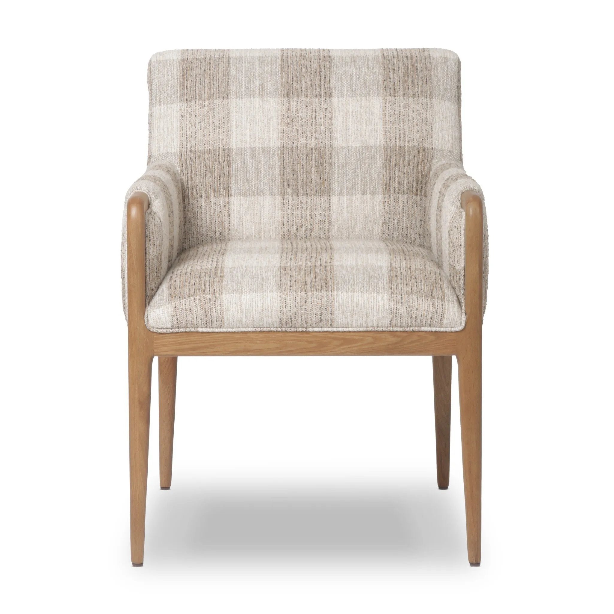 A patterned dining chair that’s all about comfort. Checkered-print upholstery is framed by light, warm oak, while a boxy profile and higher arms feel prime for the head of the table Amethyst Home provides interior design, new home construction design consulting, vintage area rugs, and lighting in the Charlotte metro area.
