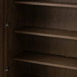Made from rustic-finished oak with a plinth-style base, clean angles and linear reeding define this midcentury-spirited cabinet. Fully finished interior for a beautiful look inside and out. Designed in partnership with longtime Four Hands collaborator Thomas Bina and Brazilian designer Ronald Sasson. Amethyst Home provides interior design, new home construction design consulting, vintage area rugs, and lighting in the Newport Beach metro area.